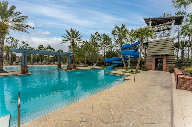 562 Kendall Crossing Dr, Saint Johns, FL 32259 - community pool with a pergola, a patio area, and a water slide