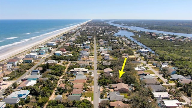 bird's eye view with a view of the beach and a water view