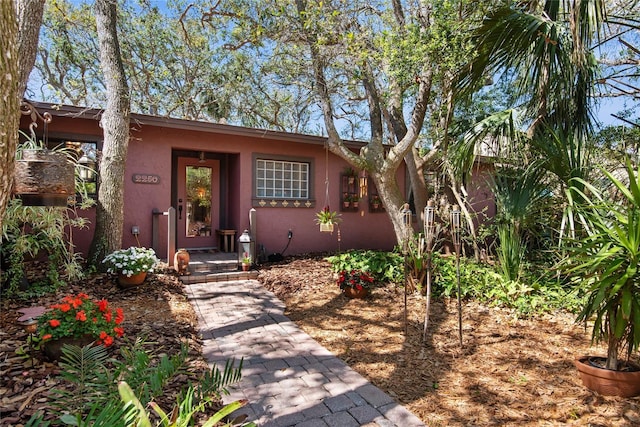 view of front of home featuring stucco siding