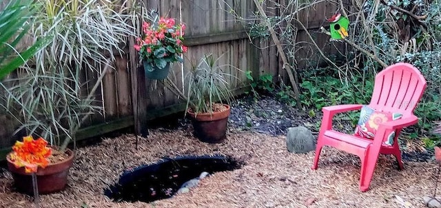 view of yard featuring fence