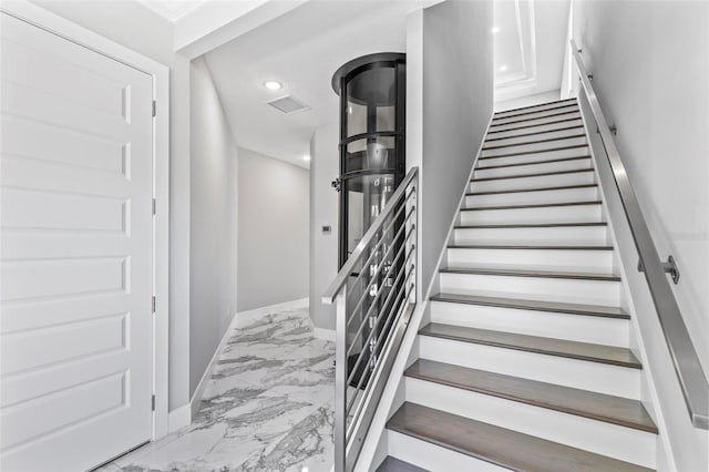 stairs featuring recessed lighting, marble finish floor, visible vents, and baseboards