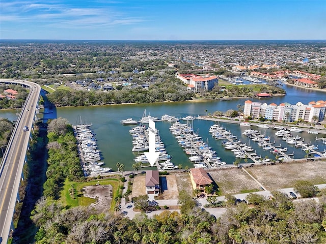 birds eye view of property featuring a water view