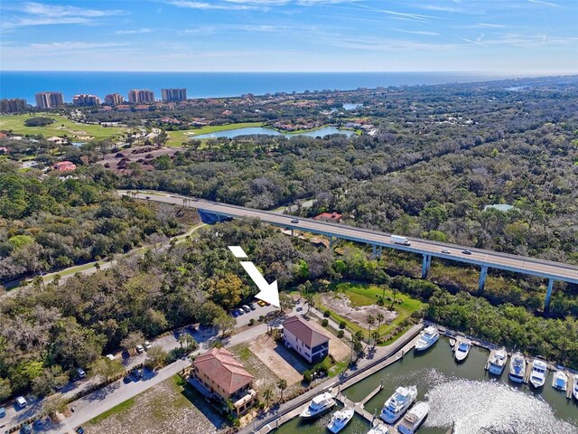 drone / aerial view featuring a water view