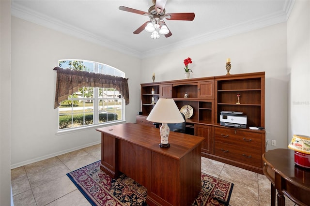 office space with ceiling fan, light tile patterned floors, baseboards, and crown molding