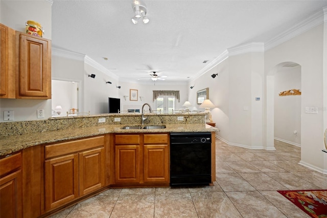 kitchen with black dishwasher, arched walkways, light stone counters, a peninsula, and a sink