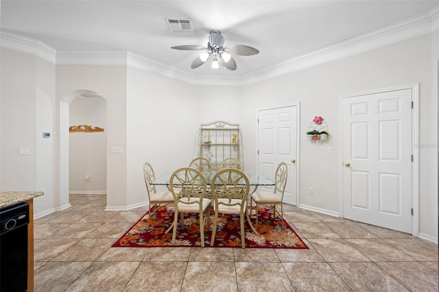 dining area featuring arched walkways, visible vents, ceiling fan, and light tile patterned floors