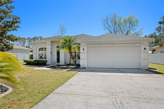 view of front of house featuring a garage, fence, concrete driveway, and a front yard