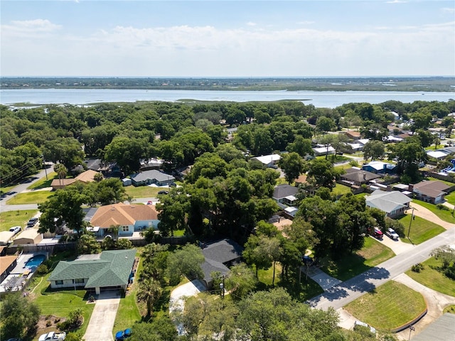 bird's eye view featuring a residential view and a water view