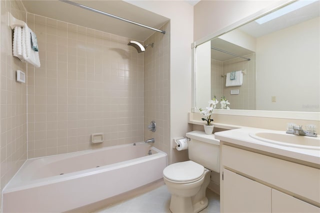 bathroom with vanity, shower / tub combination, and toilet