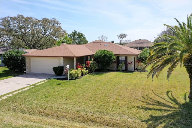 single story home featuring driveway, an attached garage, and a front yard