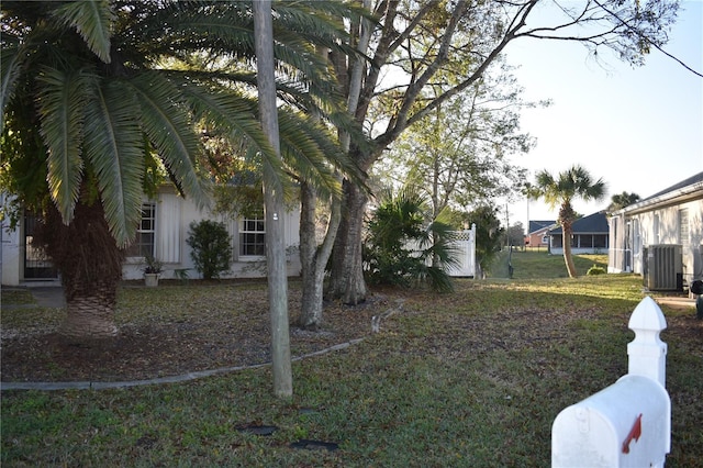 view of yard with central AC unit