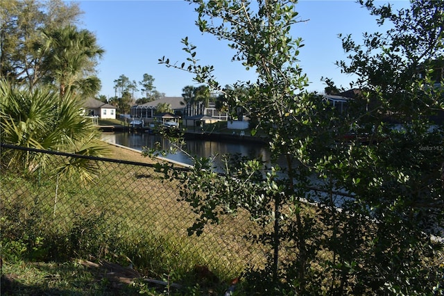 property view of water with fence