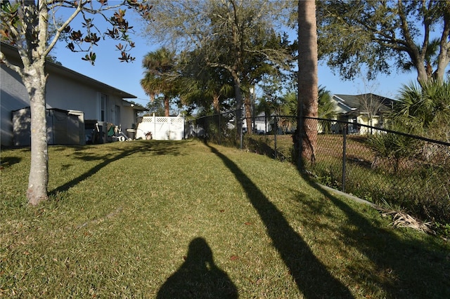 view of yard with fence