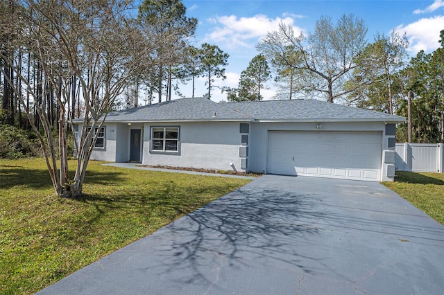 ranch-style house featuring stucco siding, an attached garage, fence, driveway, and a front lawn