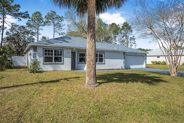 ranch-style home with a garage, driveway, fence, a front lawn, and stucco siding