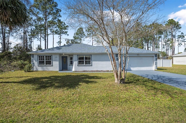 ranch-style house with concrete driveway, an attached garage, fence, a front lawn, and stucco siding