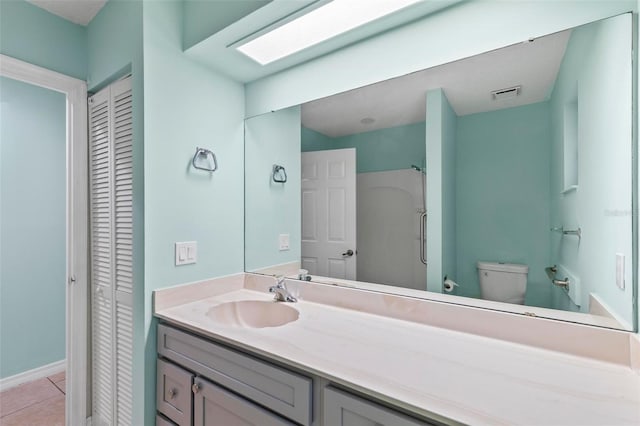 full bath featuring visible vents, a closet, vanity, and toilet