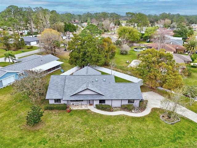 birds eye view of property with a residential view