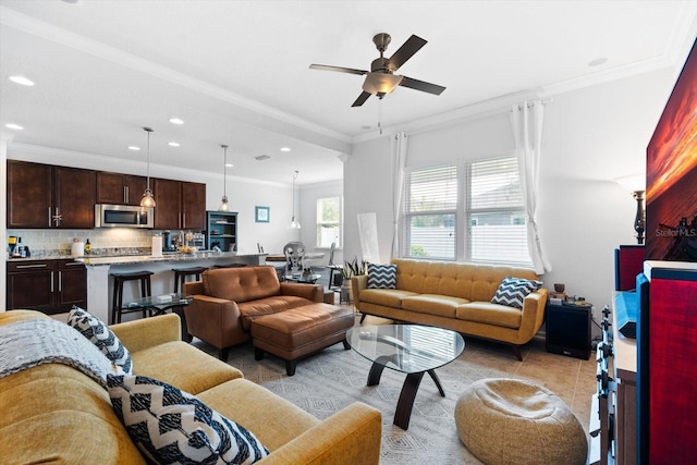 living room featuring ornamental molding, recessed lighting, light tile patterned flooring, and ceiling fan