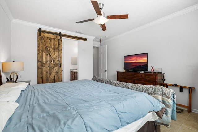 bedroom featuring a barn door, visible vents, crown molding, and tile patterned floors