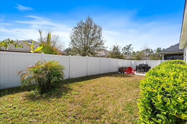 view of yard featuring a fenced backyard