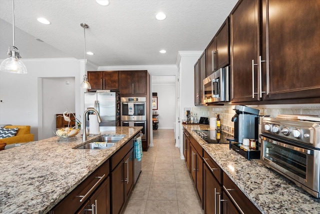 kitchen featuring light tile patterned flooring, stainless steel appliances, a sink, ornamental molding, and tasteful backsplash