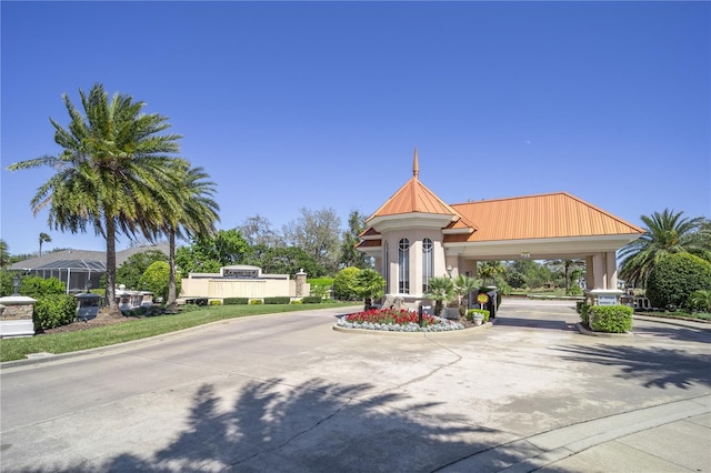 view of property with concrete driveway