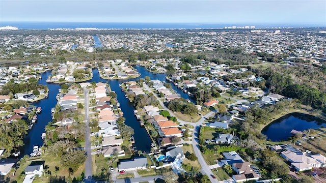 bird's eye view with a water view and a residential view