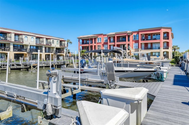 dock area featuring a water view and boat lift