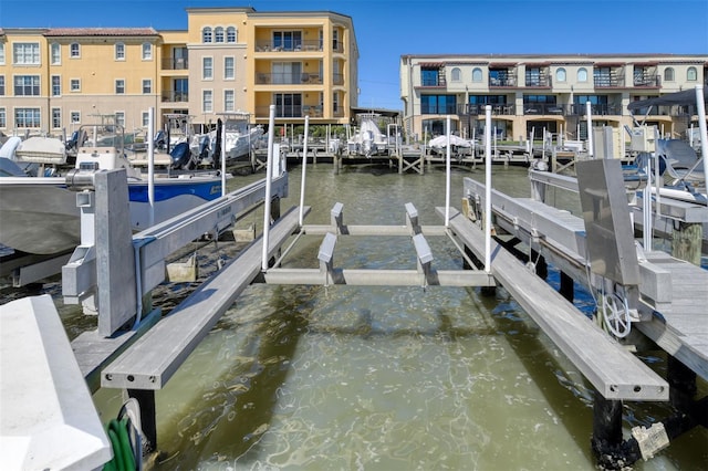 view of dock with a water view and boat lift