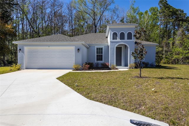 6 Zamia Pl, Palm Coast, FL 32164 - view of front of property with a front lawn, roof with shingles, stucco siding, a garage, and driveway