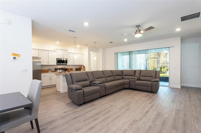 6 Zamia Pl, Palm Coast, FL 32164 - living area with recessed lighting, visible vents, and light wood-style flooring