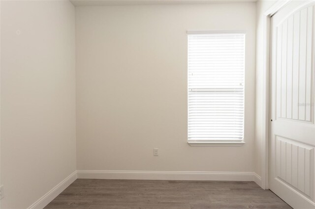 6 Zamia Pl, Palm Coast, FL 32164 - unfurnished room with light wood finished floors and baseboards