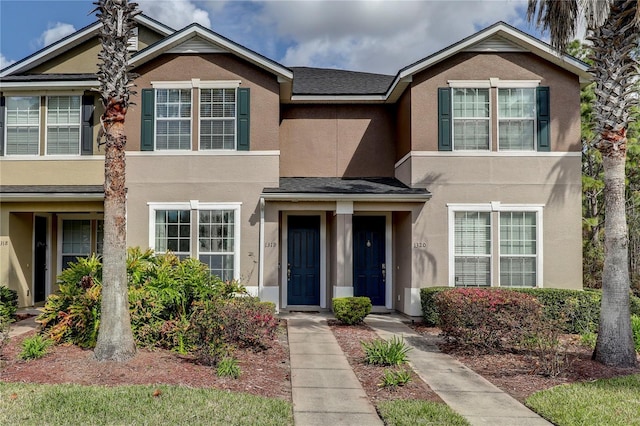 view of property with stucco siding