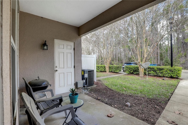 view of patio featuring central AC