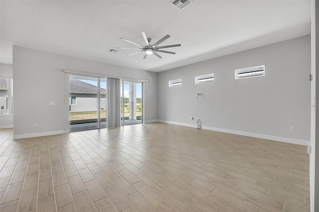 unfurnished living room featuring visible vents, baseboards, light wood-style flooring, and a ceiling fan