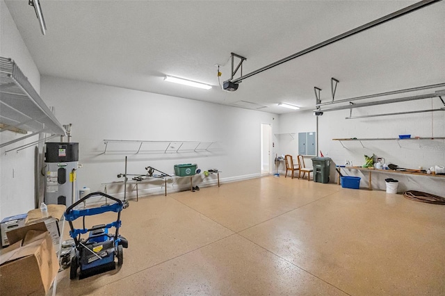 garage featuring electric panel, a garage door opener, and water heater