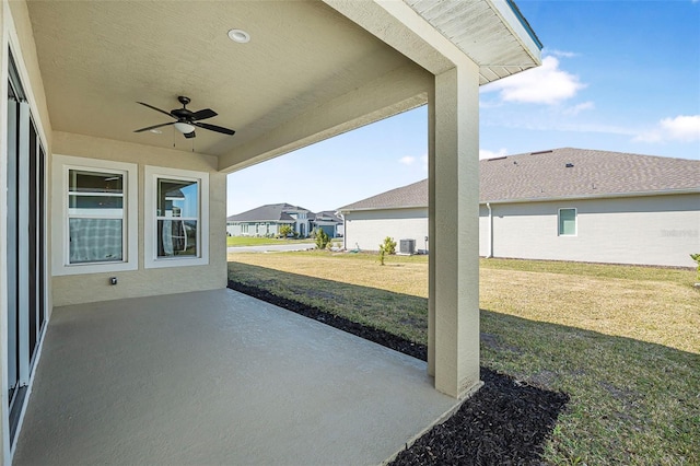 view of patio / terrace with a residential view and ceiling fan