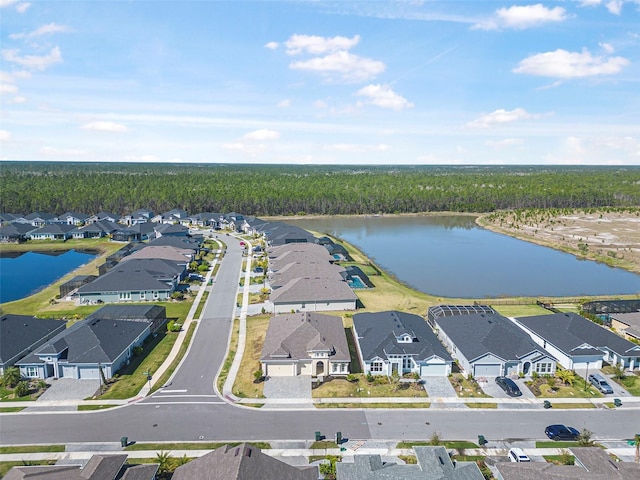 aerial view with a residential view and a water view