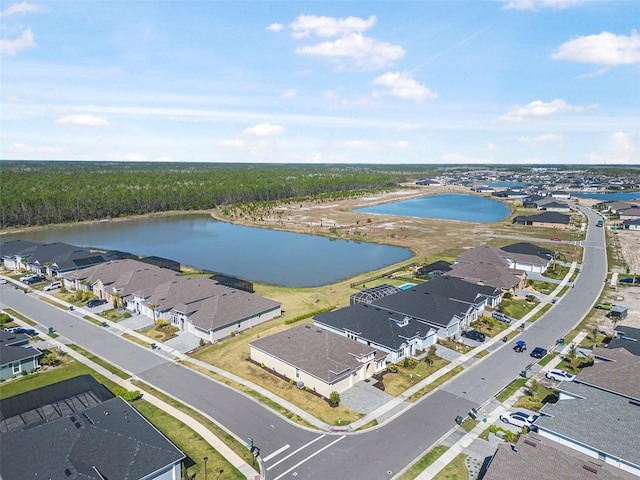 aerial view with a residential view and a water view