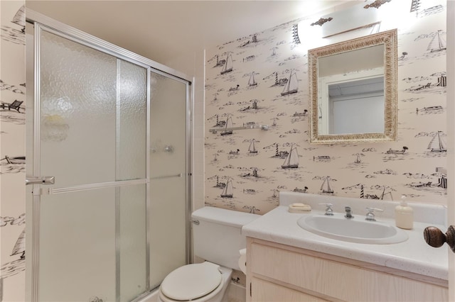 full bath with toilet, wallpapered walls, vanity, and a stall shower