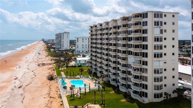 drone / aerial view with a view of the beach and a water view