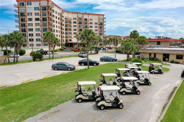 view of property's community with a lawn