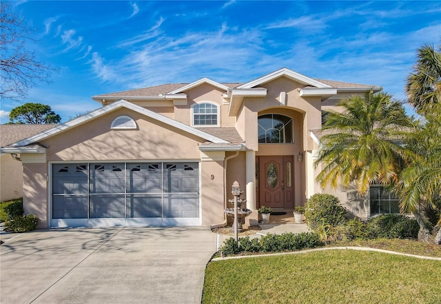 9 Cedar Hollow Ct, Palm Coast, FL 32137 - mediterranean / spanish-style home with stucco siding, an attached garage, and concrete driveway