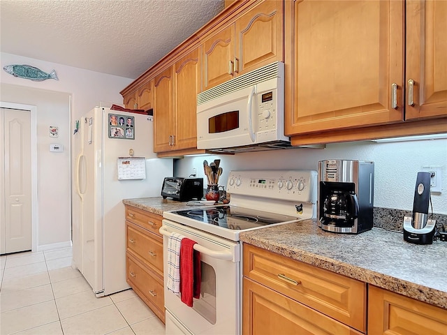 9 Cedar Hollow Ct, Palm Coast, FL 32137 - kitchen featuring a textured ceiling, brown cabinets, light tile patterned floors, white appliances, and a toaster