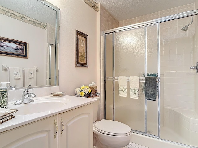 9 Cedar Hollow Ct, Palm Coast, FL 32137 - full bath with a textured ceiling, toilet, a stall shower, and vanity