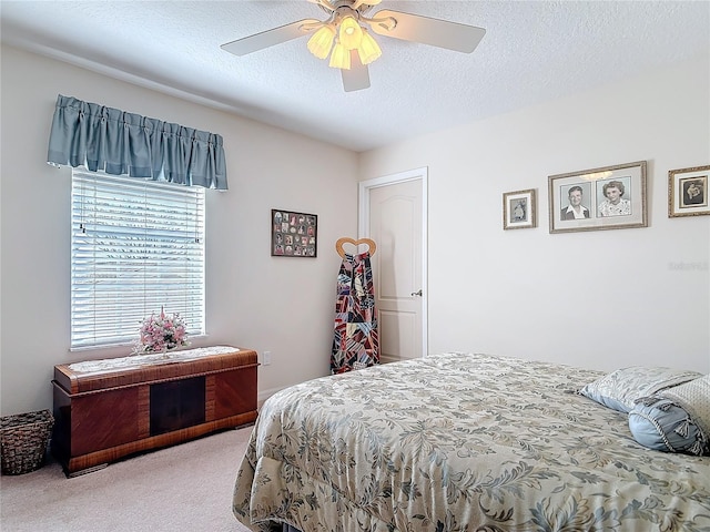 9 Cedar Hollow Ct, Palm Coast, FL 32137 - bedroom with carpet flooring, a ceiling fan, and a textured ceiling