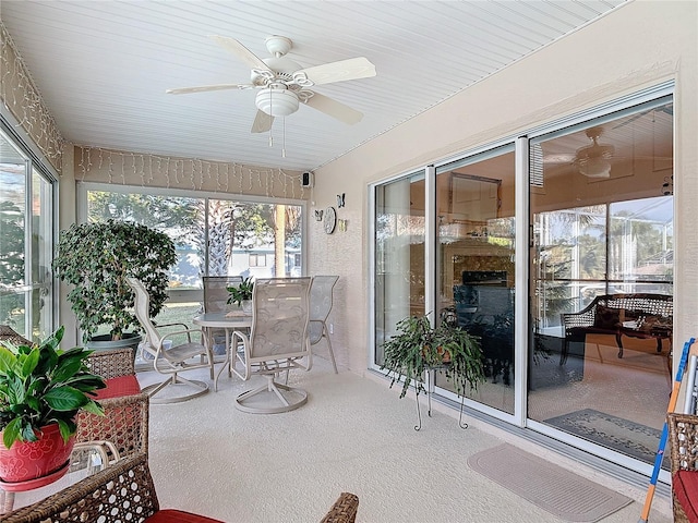 9 Cedar Hollow Ct, Palm Coast, FL 32137 - sunroom with a ceiling fan and carpet
