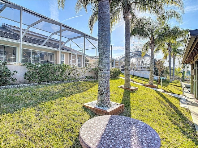 9 Cedar Hollow Ct, Palm Coast, FL 32137 - view of yard featuring a lanai and fence
