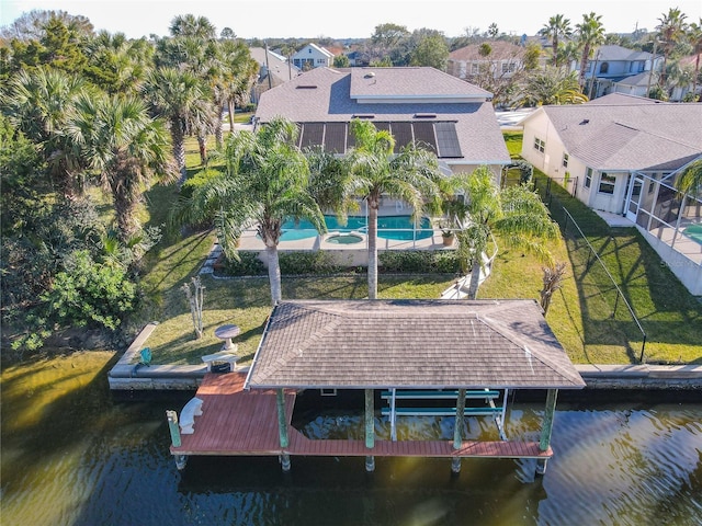 9 Cedar Hollow Ct, Palm Coast, FL 32137 - view of dock with glass enclosure, an outdoor pool, a residential view, a water view, and a yard